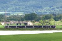 The 1613 Perth - Glasgow Queen Street seen shortly after passing Hilton Junction on 5 June. The Earn Bridge on the E&NR is behind the train.<br>
<br><br>[Brian Forbes 05/06/2009]