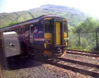 View from a train on 1 June 2009, as a patient driver in Glen Douglas passing loop observes the Glasgow - Mallaig super sprinter on its way north.<br><br>[Brian Smith 01/06/2009]