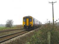 156421 on a Southport to Manchester Victoria service approaching Burscough Bridge on 3 April 2009.<br>
<br><br>[John McIntyre 03/04/2009]