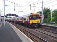 318254 westbound from Bellshill on 9 June 2009.<br><br>[John Steven 09/06/2009]