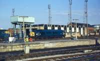 Class 45 'Peak' class loco no.93 sits outside the Bath Road diesel shed opposite Bristol Temple Meads station on 30 July 1971. A class 35 Hymek and an 08 are visible on the left with a few enthusiasts observing locomotive movements.<br><br>[John McIntyre 30/07/1971]