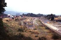 View east at Newton Stewart in September 1973. The old goods shed and yard on the left of the photograph have been put to alternate use by the local council, still the case 35 years on [see image 15528].<br><br>[Colin Miller /09/1973]