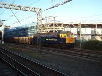 47375 was in the news a lot in 2009. On 250209 it failed north of Preston, was dragged into the station area to await further assistance and is seen here waiting on a through road in front of the new multi-storey car park. Two days later 47375 was hauled away by 47810 [see image 22665] and fairly quickly condemned and sent to Booths at Rotherham. However it was later reported that it has been secured, removed from the scrapyard and taken to Barrow Hill.<br><br>[Mark Bartlett 25/02/2009]