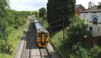 With the slow lines south of Preston closed for track renewals, services to and from York/Leeds and Blackpool were diverted via Farington Junction during the evening of 13 June and the morning of 14 June. A Blackpool bound 158752 is seen having just left the East Lancs lines at Lostock Hall Junction on 14 June 2009. Once it reaches the WCML at Farington Junction it will have to reverse in order to reach Preston via the Down Fast line. Note the building to the right of the photograph - considering how close the location is to the WCML some might find it a little surprising that  <I>The Railway</I> public house sign features an LNER A4 in garter blue!<br><br>[John McIntyre 14/06/2009]