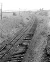 Looking towards Lochwinnoch from the overbridge at the south end of Kilbarchan village in 1974.<br>
<br><br>[Colin Miller //1974]