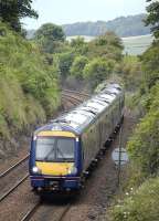 170 395 and a 158 unit form the 13.35 Edinburgh-Inverness service heading downhill towards Aberdour on 15 June 2009<br>
<br><br>[Bill Roberton 15/06/2009]