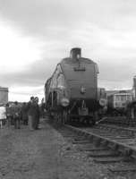 Gresley A4 no 60009 on display at the Inverness Railfair on 09 Jun 73. Also brought in for the event is a Class 303 Glasgow <I>Blue Train</I>. <br><br>[John McIntyre 09/06/1973]