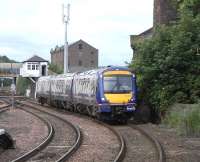 170 411 about to run into Arbroath station on 15 June with an Aberdeen - Glasgow service, after passing Arbroath North box.<br><br>[David Panton 15/06/2009]