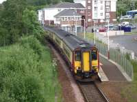 Glasgow bound 156 505departs from Hairmyres on 17 June 2009. The  offices of the East Kilbride World [newspaper] are housed within the smaller of the two white buildings in the background, the second and larger beingapartments. Part of Hairmyres Hospital ambulance depot can be seen on the extreme right.<br><br>[John Steven 17/06/2009]