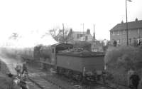 <I>Scottish Rambler no 5</I> behind 64620 on a photostop at Liff on 9 April 1966 during a visit to Dundee's Maryfield branch. The seldom photographed station at Liff, which had lost its passenger service in 1955, stood on the western outskirts of the city on the branch from Ninewells Junction and was opened by the Dundee & Newtyle Railway in 1861. The branch closed completely in June 1967, along with Maryfield goods depot. [With thanks!]<br>
<br><br>[Robin Barbour Collection (Courtesy Bruce McCartney) 09/04/1966]