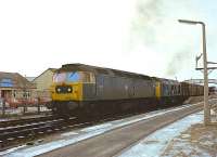 47120+25009 with a southbound freight for Aberdeen passing through Elgin station in February 1979<br><br>[Peter Todd 08/02/1979]