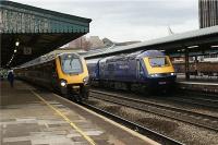 The driver of the CrossCountry service has changed ends as it sits in Platform 5 at Reading on 18 June with a service from Manchester to Bournemouth. Meanwhile a westbound HST pauses at the adjacent platform.<br><br>[John McIntyre 18/06/2009]