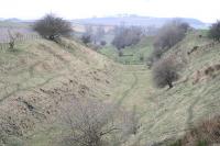 Looking north to where the Waverley route passes near to Borthwick Castle in March 2007 as the line continues toward the summit at Falahill.<br><br>[James Young 14/03/2007]