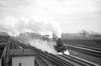 Jubilee 4-6-0 45664 <I>Nelson</I> has just passed Kingmoor shed (left background) in the early 1960s heading north with a train on the WCML. On the far right of the picture an A3 can be seen running through Stainton at the head of a down Waverley line service.<br><br>[Robin Barbour Collection (Courtesy Bruce McCartney) //]