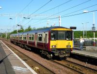 318 269 awaits its departure time from Newton on 23 June with a service for Glasgow Central.<br><br>[John Steven 23/06/2009]