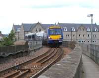 Crossing the Tay at Perth on 16 June 2009. Aberdeen bound 170 417 runs onto the viaduct shortly after passing the site of Perth Princes Street station.<br><br>[David Panton 16/06/2009]