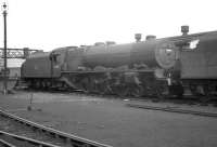Stanier <I>Princess</I> Pacific no 46200 <I>The Princess Royal</I> (or most of her) stands in a siding at Carlisle Upperby shed in March 1964 having been officially withdrawn by BR in November 1962. It was almost two years from withdrawal to eventual disposal at the hands of Messrs Connell & Co of Coatbridge, in October 1964. <br><br>[K A Gray 07/03/1964]