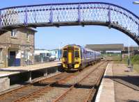 158720 is about to set off from Georgemas Junction for Thurso, having recently arrived from Inverness on a warm and sunny 25 June.<br><br>[Brian Smith 25/06/2009]