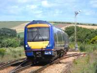 Heralded by a clatter of bells and a clunk of levers in the box behind me, 170 408 arrives at Stonehaven with a service for Glasgow Queen Street on 18 June 2009<br><br>[David Panton 18/06/2009]