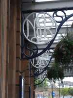 LNER monogrammed canopy supports outside the booking hall at Berwick, surprisingly ornate considering the period.<br><br>[David Panton 17/06/2009]