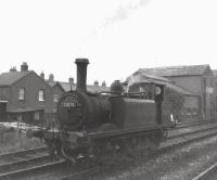 Ex-LBSCR <I>Terrier</I> 0-6-0T no 32678 (now preserved on the KESR) runs round the Hayling Island branch train at Havant Station on 7 December 1962.<br><br>[David Pesterfield 07/12/1962]