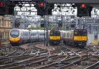 A Euston bound Pendolino passes 314 202 and 314 205 on the Clyde Viaduct in June 2009.<br><br>[Bill Roberton 28/Ju/2009]