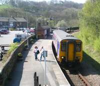 Northern 156463 forming the 1038 ex-Middlesbrough is about to leave Grosmont for Whitby on a balmy Monday 20 April 2009. The NYMR platforms are off to the left on the other side of the car park.  <br>
<br><br>[John Furnevel 20/04/2009]