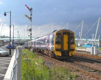 The rear of a 4-car 158 as it approaches Platform 2 at Stirling on 16 June with a Dunblane service.  the driver has a clear road right through Stirling as far as Dunblane. Point of interest - the signal post shows (from top down) Stirling Middles Down Starter Cleared. Stirling Norths Down Distant cleared and Stirling Middles rather rare Calling On signal. The calling on signal is used  when the track ahead (at the station platform) is already occupied by a train and a following train is to be allowed to share the same section of track at the platform (and be prepared to stop before running into it). Another surviving Calling On signal is to be found at Girvan.<br><br>[David Panton 16/06/2009]