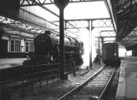 Black 5 no 44903 with a boat train at Greenock Princes Pier in October 1965. The station had closed to scheduled passenger services in February 1959 but boat train traffic continued until November 1965. Freight services ended in September of 1966 and the station was demolished the following year.<br><br>[Robin Barbour Collection (Courtesy Bruce McCartney) 30/10/1965]