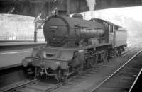 Looking across the Waverley east end bays in August 1959 with Gresley class D49 4-4-0 no 62718 <I>Kinross-Shire</I> about to depart for St Margarets shed, having recently brought in a train off the Waverley route.<br><br>[Robin Barbour Collection (Courtesy Bruce McCartney) 21/08/1959]