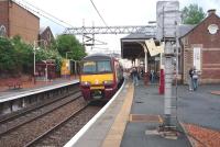 A Helensburgh Central service arrives at Coatbridge Sunnyside on 1 July 2009.<br><br>[John Steven 01/07/2009]