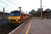 The up <I>Highland Sleeper</I>, with through sleeping cars from Fort William, Inverness and Aberdeen, calls at Preston station around 0430 hrs on 23 June behind EWS 90026. At this point the driver of what became a combined 15 coach train at Edinburgh Waverley prepares to hand over to a colleague for the remainder of the journey to London Euston.<br><br>[John McIntyre 23/06/2009]