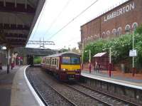 An eastbound service runs into Coatbridge Sunnyside on 1 July on its way to Drumgelloch<br><br>[John Steven 01/07/2009]