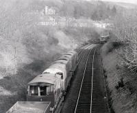 Some <I>remodelling</I> underway on the approach to Largs in 1985 with 4 class 20s in attendance. View is towards Fairlie, with a  crossover and signal arm having been recently removed.<br>
<br><br>[Colin Miller //1985]