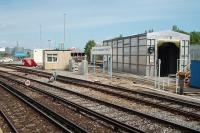 Fratton Depot is situated on the down side at Fratton station as can be seen here in this view from the station's down side island platform. A rush hour view and so the depot sidings are empty but will be busy later in the evening. <br><br>[Mark Bartlett 18/06/2009]