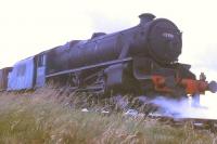 During the last month of BR steam working, Black 5 no 45110 of Lostock Hall shed (now preserved on the Severn Valley Railway) stands in the Courtaulds sidings near Ribbleton waiting to return to Preston. The locomotive had brought in a trainload of coal to the factory which, at that time, with its cooling towers,was a landmark alongside the M6 motorway near Preston, but has since been demolished. <br><br>[David Hindle /07/1968]