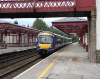 Running slightly late, the 1711 to Glasgow Queen Street departs Gleneagles on 16 June, formed by 170 410.<br><br>[David Panton 16/06/2009]