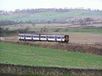 A Dunblane - Waverley service approaches Philpstoun in 2003.<br><br>[James Young 06/12/2003]
