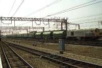 The Hunslet Barclay weedkilling train arrives at Crewe off the Shrewsbury line in August 1990. 20902 is leading and 20905 is on the rear.<br><br>[John McIntyre 25/08/1990]