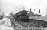 A V2 takes a brake van north through Steele Road in the mid-1960s.<br><br>[Robin Barbour Collection (Courtesy Bruce McCartney) //]