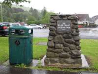 The cairn erected in Langholm marking the site of the former station and recording the departure of the last train. The cairn continues to be a focal point in the annual Langholm Common Riding celebrations. July 2009.  <br>
<br><br>[Bruce McCartney /07/2009]