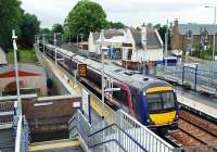 An Aberdeen - Glasgow Queen Street service calls at Laurencekirk on 12 July 2009. Note the successfully restored (as opposed to demolished) main building on the down platform [see image 13322].<br><br>[Ewan Crawford 12/07/2009]