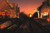 Darley Dale station looking north towards Rowsley from the level crossing. The signalbox is on the edge of the photograph to the right. Today this is a preserved station on Peak Rail.<br><br>[Ewan Crawford 13/01/2005]