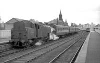 Fairburn 2-6-4T no 42058 stands at Lanark platform 1 in the mid 1960s with a train for Carstairs, while a DMU for Glasgow waits at platform 2. The locomotive was withdrawn from Carstairs shed in August of 1966 and cut up at MMS, Wishaw, by the end of that year. <br><br>[Robin Barbour Collection (Courtesy Bruce McCartney) //1964]