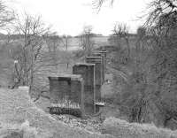 Remains of the viaduct over the North Calder Water on the former Moffat Mills branch. The branch had remained open until the mid 1980s to carry grain traffic to Inverhouse distillery.<br><br>[Bill Roberton //]