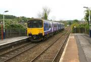 A Northern Rail service to Buxton departs from Whaley Bridge on the climb up to Chapel-en-le-Frith on 13 May 2009. 150149 is the unit doing the work.<br><br>[John McIntyre 13/05/2009]