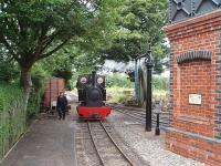 Timeless rural scene, by the shed and water tank on the <I>small but perfectly formed</I> West Lancashire Light Railway as Kerr Stuart 0-4-2ST <I>Stanhope</I> runs round its train before another trip down the short line to Delph Halt. <br><br>[Mark Bartlett 19/07/2009]