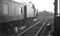 An A3 Pacific pulls out of Newcastle Central in 1965 and heads for the King Edward Bridge with the up <I>Tees-Tyne Pullman</I>. Introduced in 1948, this was the first BR train other than the London - Paris <I>Golden Arrow</I> to carry a dedicated <I>bar coach</I> (dubbed <I>The Hadrian Bar</I>). The ageing non-air conditioned stock, coupled with the planned introduction of IC125 sets, resulted in the service eventually being withdrawn in 1976.  <br>
<br><br>[K A Gray //1965]