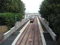 A northbound train pulls away from its stop at Laurencekirk in July 2009.<br><br>[John Robin 28/07/2009]