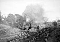 Having brought in a short freight from Thornton, J38 no 65915 shunts the yard at Leslie in the mid sixties. The branch finally closed to all traffic in 1967 and the impressive Leslie viaduct (off picture to the right ) is now part of a walkway [See image 3993]<br>
<br><br>[Robin Barbour Collection (Courtesy Bruce McCartney) //1966]